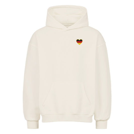 Grauer Pelasgia Heimatliebe Oversized Hoodie aus weichem Stoff, mit großem Aufdruck auf der Vorderseite.