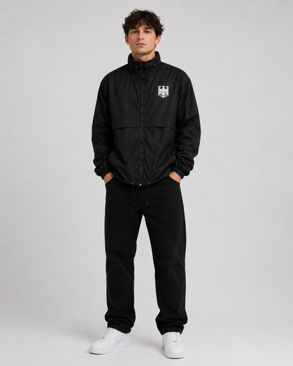 Leichte Windbreaker-Jacke von Pelasgia mit Deutschland-Design, winddichtes Material, ideal für Outdoor-Aktivitäten.